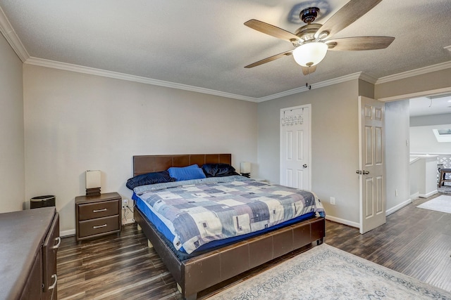 bedroom with ceiling fan, dark hardwood / wood-style flooring, a textured ceiling, and ornamental molding