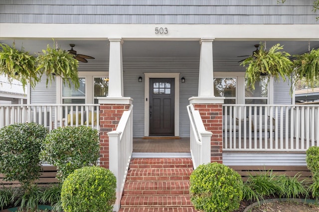 property entrance featuring covered porch and ceiling fan