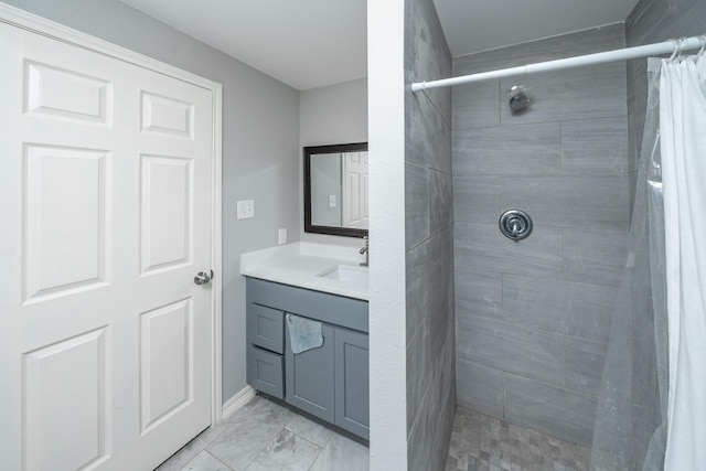 bathroom with vanity and walk in shower