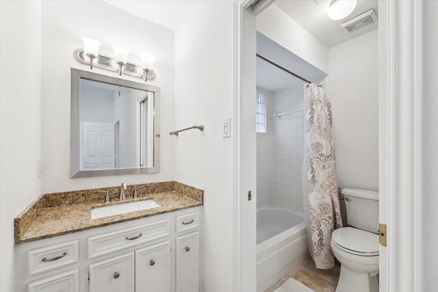 full bathroom featuring vanity, toilet, and shower / tub combo with curtain