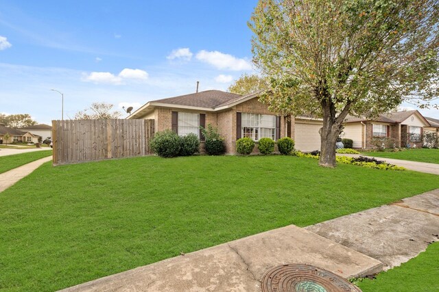 ranch-style house with a front lawn