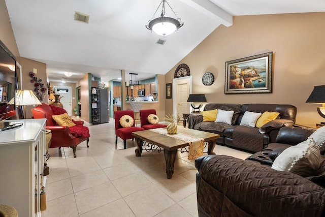 tiled living room featuring vaulted ceiling with beams