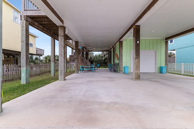 view of patio with a garage and a carport