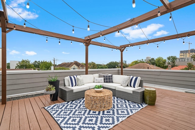 wooden terrace featuring an outdoor living space