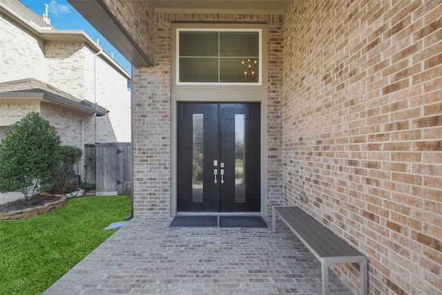 entrance to property featuring french doors