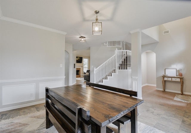 dining room with ornamental molding