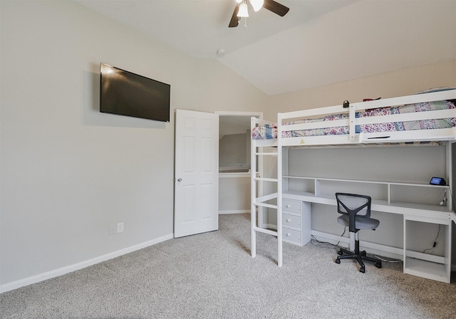 unfurnished bedroom featuring ceiling fan, carpet floors, and vaulted ceiling