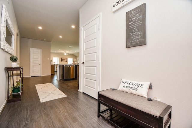 corridor featuring dark wood-type flooring