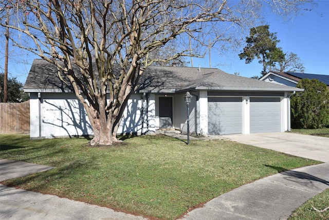 ranch-style house with a front lawn, fence, concrete driveway, roof with shingles, and an attached garage