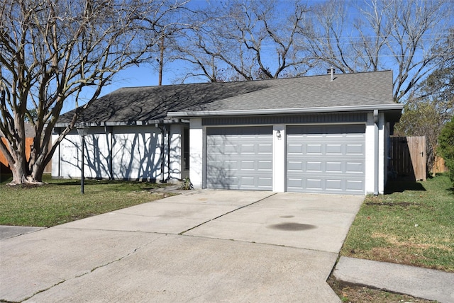 garage with concrete driveway