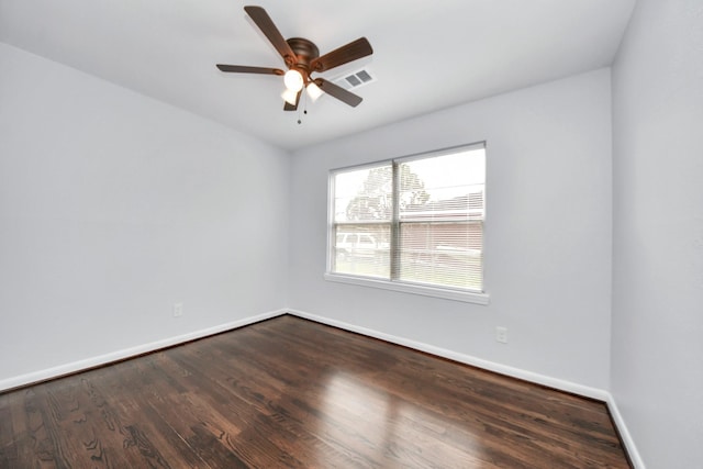 unfurnished room featuring dark hardwood / wood-style flooring and ceiling fan