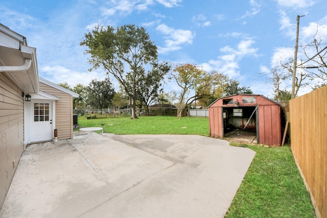 view of patio / terrace featuring a shed