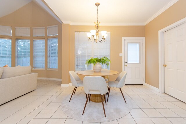 dining area with light tile patterned floors, crown molding, and a chandelier