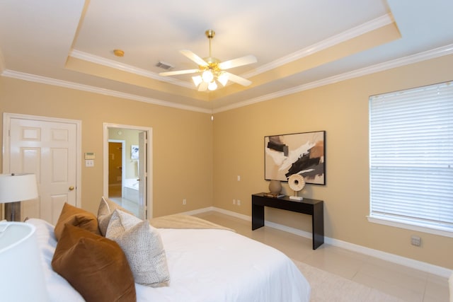 bedroom featuring a raised ceiling, ceiling fan, crown molding, and light tile patterned flooring