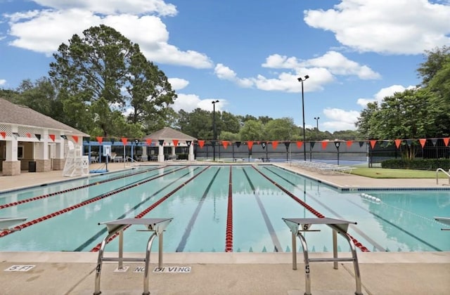 view of swimming pool featuring a patio