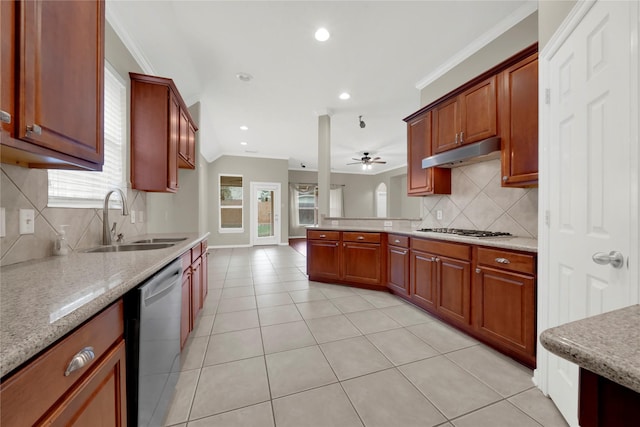 kitchen featuring ceiling fan, sink, light stone counters, crown molding, and appliances with stainless steel finishes