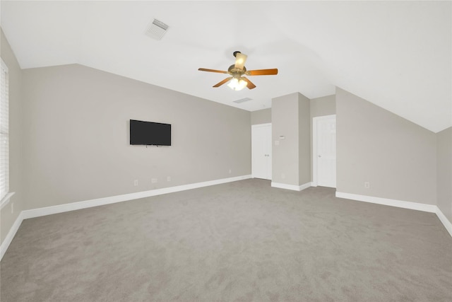 bonus room with ceiling fan, carpet, and lofted ceiling