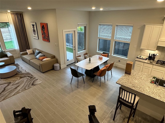 dining room with light hardwood / wood-style floors