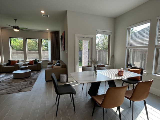 dining space featuring ceiling fan