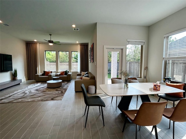 dining space with ceiling fan