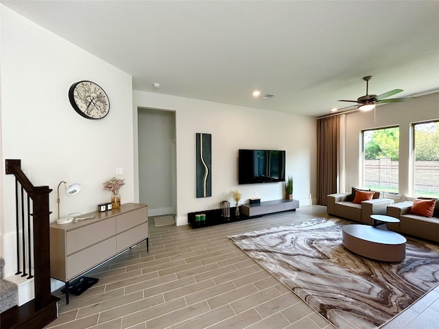 living room featuring ceiling fan