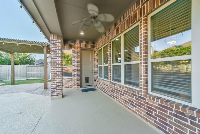 view of patio / terrace featuring ceiling fan