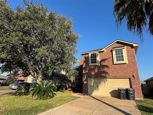 view of front facade featuring a garage and a front lawn