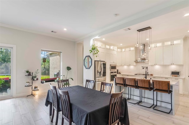 dining room with crown molding