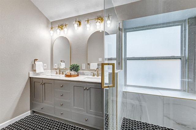 bathroom featuring vanity and walk in shower