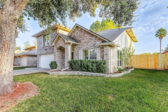 view of front facade featuring a garage and a front lawn