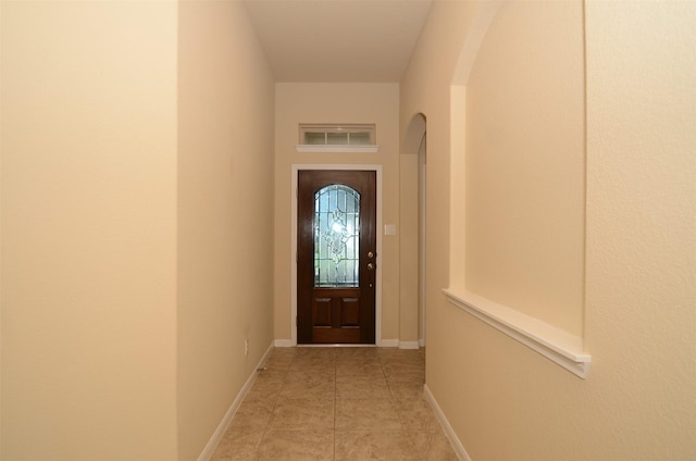 entryway featuring light tile patterned floors