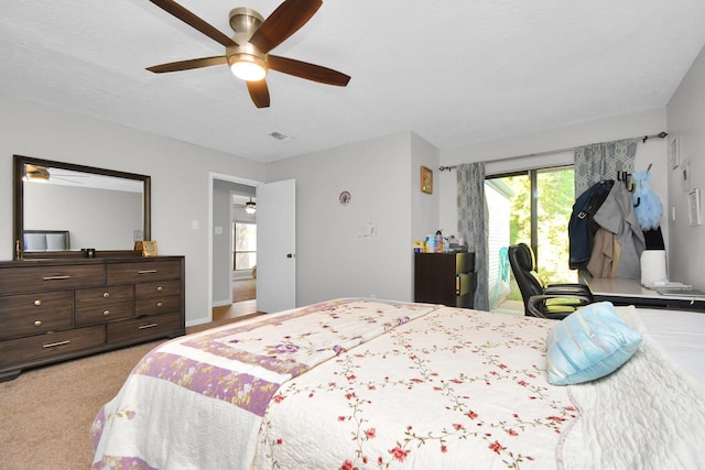 bedroom featuring visible vents, access to outside, a ceiling fan, and light colored carpet