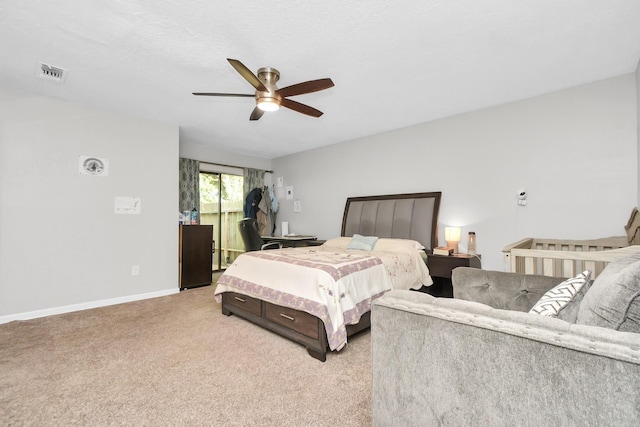 bedroom with ceiling fan, carpet, visible vents, and baseboards