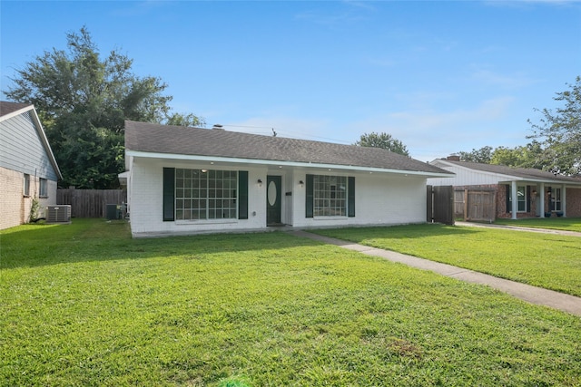 single story home featuring central AC unit, a porch, and a front yard