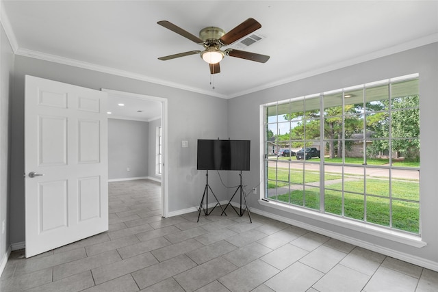 unfurnished living room featuring light tile patterned floors, ceiling fan, and crown molding