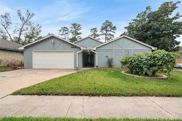 single story home with a front lawn and a garage