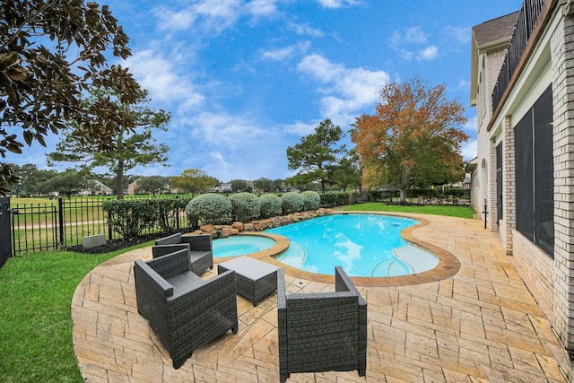 view of pool featuring a patio area