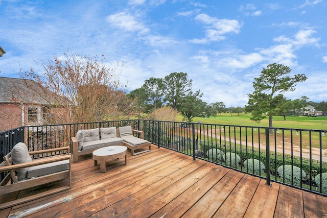 wooden terrace with outdoor lounge area