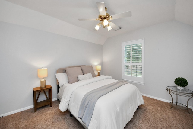 bedroom with carpet, vaulted ceiling, and ceiling fan