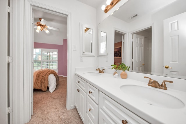 bathroom featuring vanity and ceiling fan