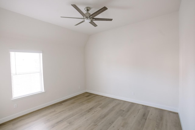 unfurnished room featuring light wood-type flooring, ceiling fan, and baseboards