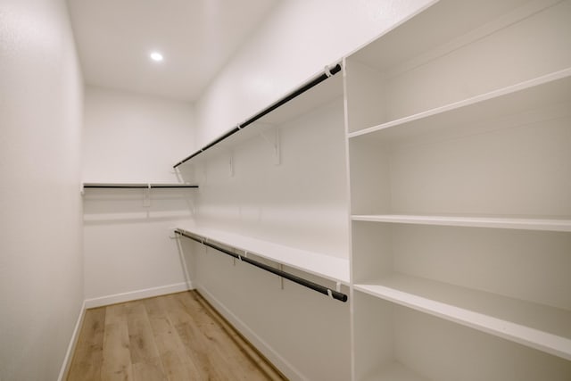 spacious closet with light wood-type flooring