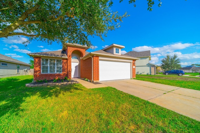 view of front facade with a garage and a front lawn