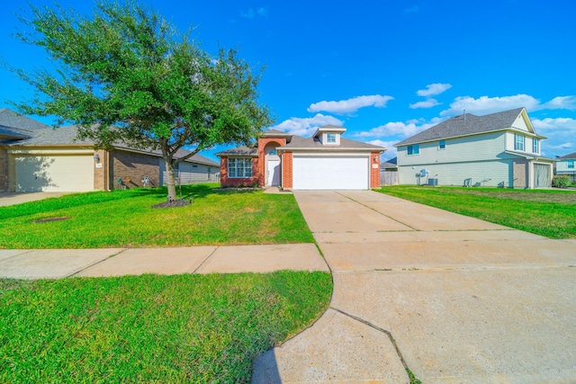 view of front facade with a front lawn and a garage