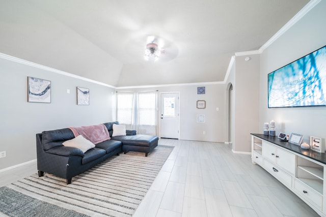 living room featuring vaulted ceiling, ceiling fan, and crown molding