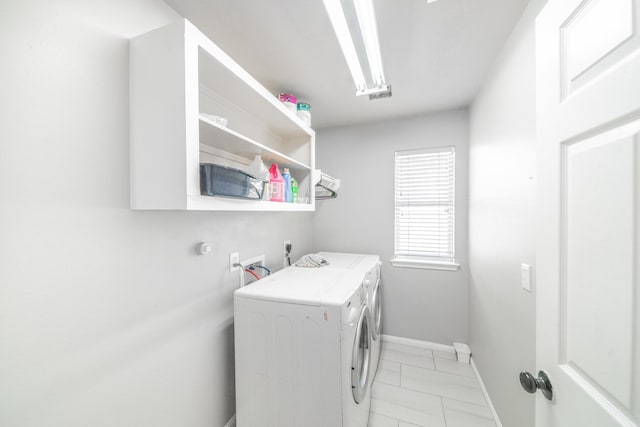 laundry area featuring washer and clothes dryer