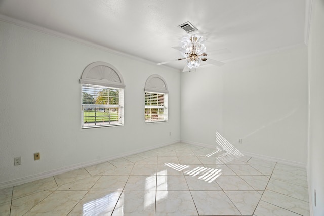 spare room featuring light tile patterned floors, ceiling fan, and ornamental molding