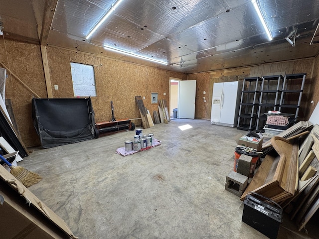 misc room with concrete floors