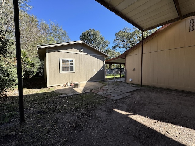 exterior space featuring an outdoor structure