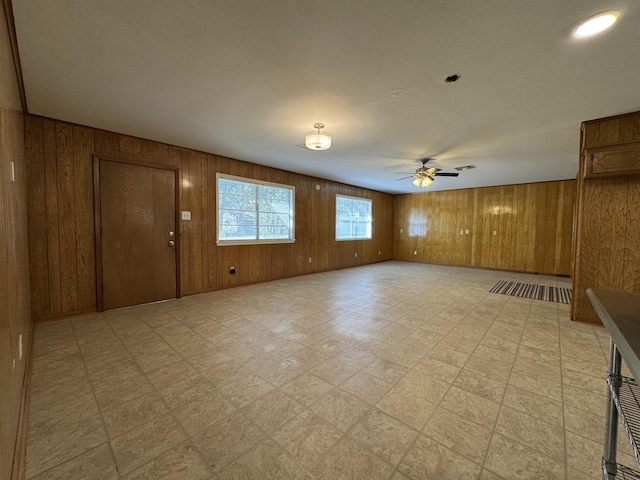 spare room with ceiling fan